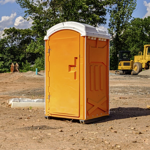 how often are the porta potties cleaned and serviced during a rental period in Woodgate